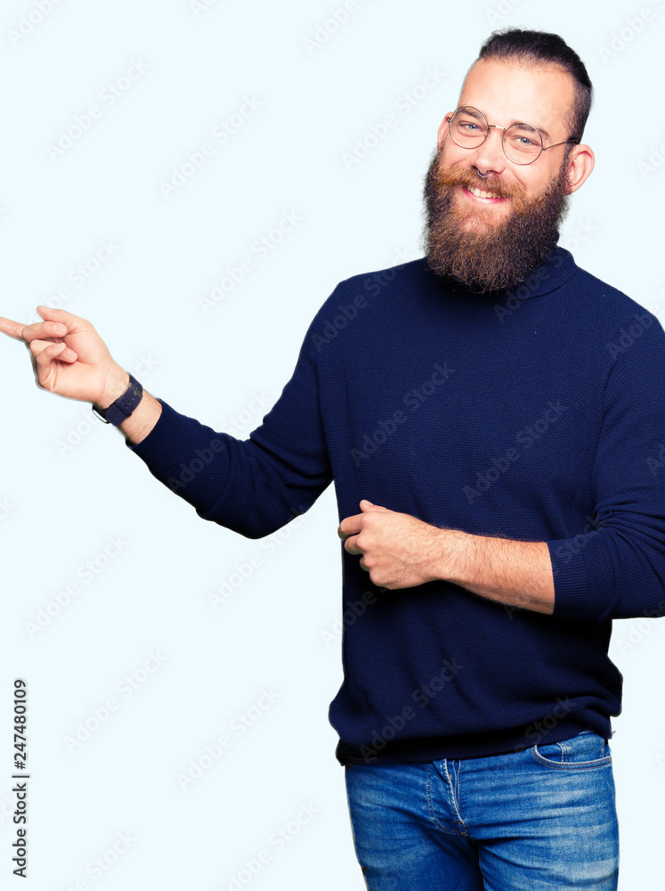 A man with a goatee and a turtle neck sweater photo – Man face