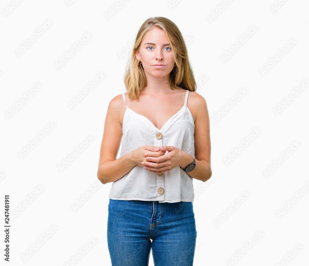 Beautiful young woman over isolated background Hands together and fingers crossed smiling relaxed and cheerful. Success and optimistic Beautiful young woman over isolated background Hands together and fingers crossed smiling relaxed and cheerful. Success and optimistic