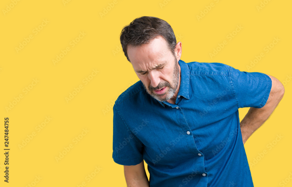 Handsome middle age elegant senior man over isolated background Suffering of backache, touching back with hand, muscular pain Handsome middle age elegant senior man over isolated background Suffering of backache, touching back with hand, muscular pain