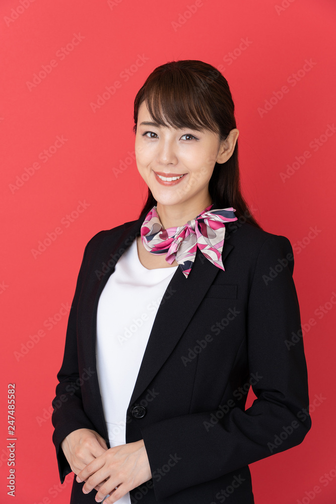 portrait of asian businesswoman isolated on red background portrait of asian businesswoman isolated on red background