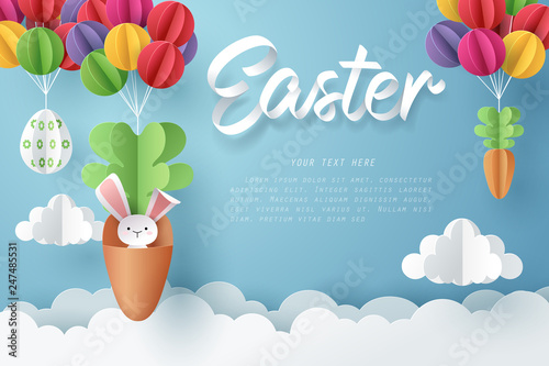 Paper art of Bunny in carrot and Easter eggs hang on colorful balloons, Happy Easter celebration concept