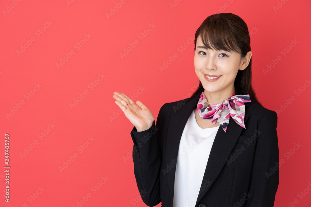 portrait of asian businesswoman isolated on red background portrait of asian businesswoman isolated on red background
