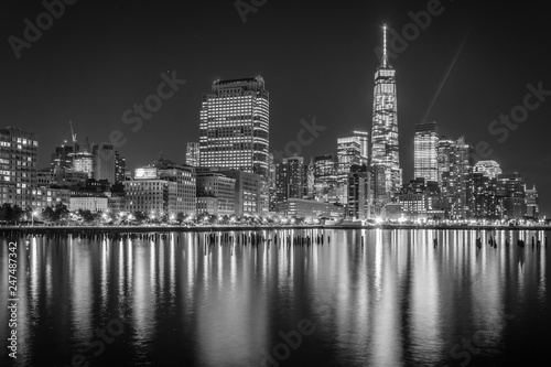One World Trade Center and Battery Park City at night, seen from Pier 34, Manhattan, New York. © jonbilous