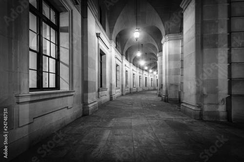 Exterior corridor of the Ronald Reagan Building and International Trade Center at night, in Washington, DC.