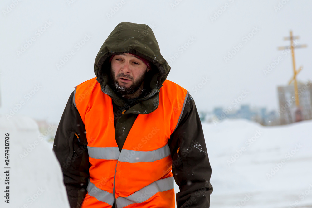 Portrait of installer in orange reflective vest Portrait of installer in orange reflective vest