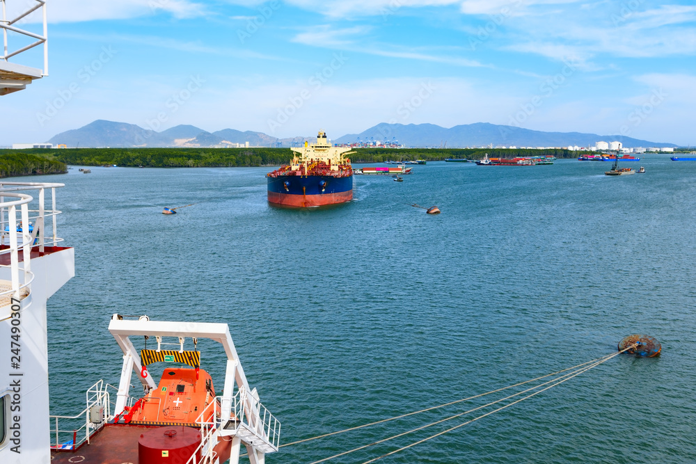 Cargo ships in Mekong river delta. Province Vung Tau, Vietnam Cargo ships in Mekong river delta. Province Vung Tau, Vietnam