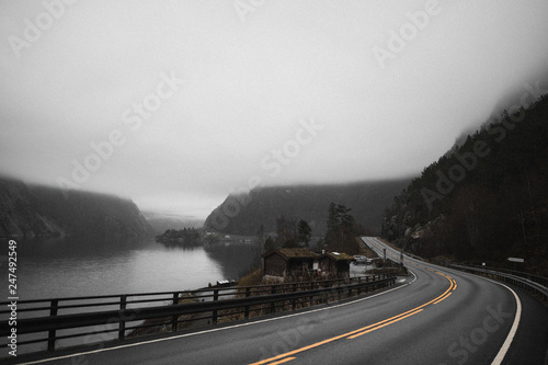 View of a misty road near the fjord in Norway