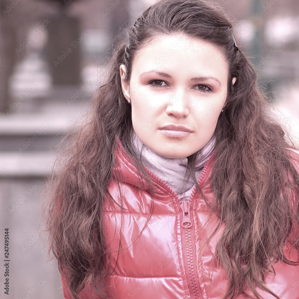close up.portrait of a young woman on blurred background