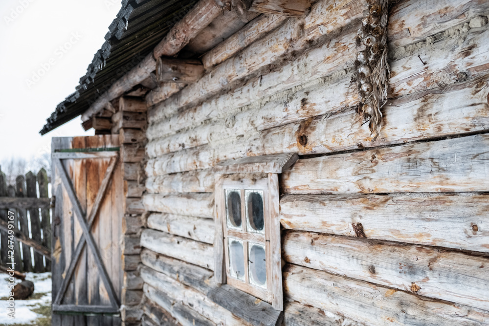 wooden house, frame, old, decrepit, in the field in winter wooden house, frame, old, decrepit, in the field in winter