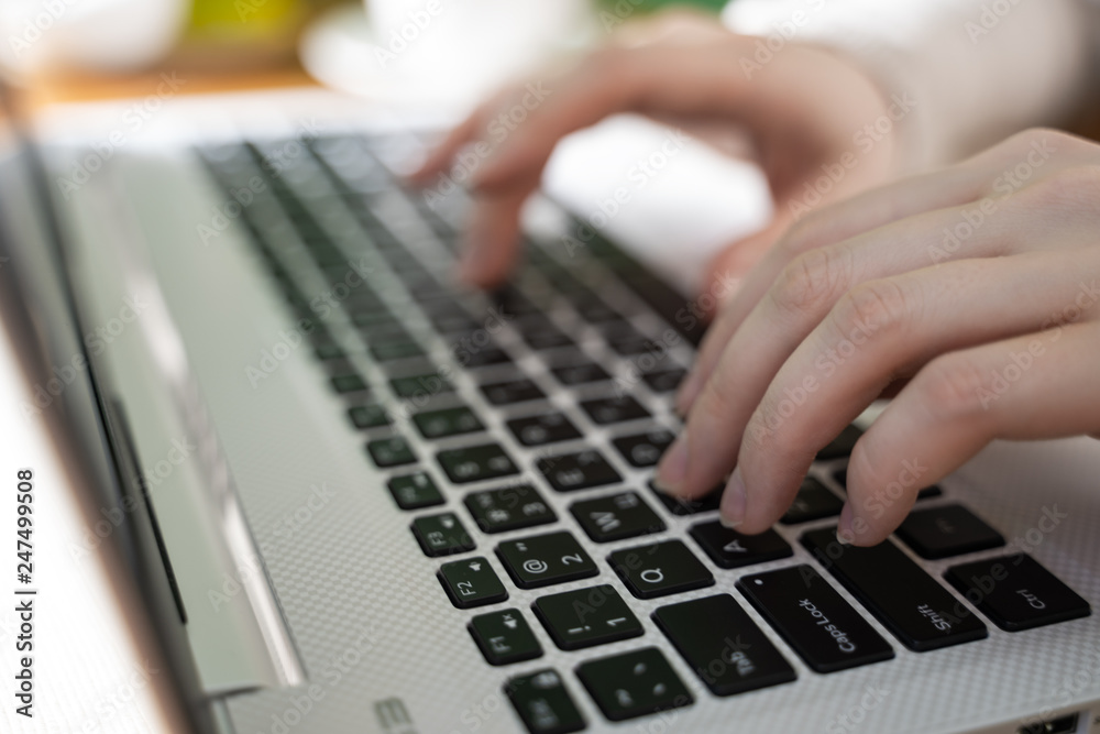 Female hands or woman office worker typing on the keyboard Female hands or woman office worker typing on the keyboard