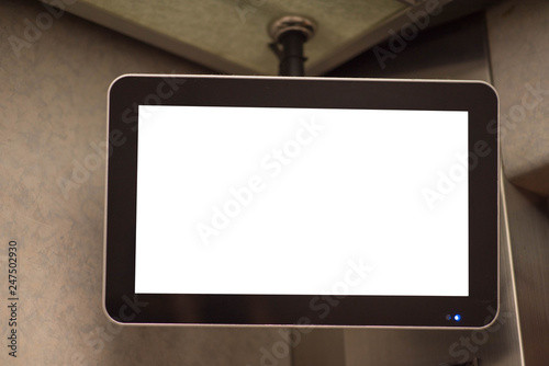 TV screen in elevator.