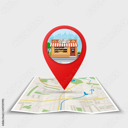 The best location bakery. Folded maps with color Point on the map with building. Vector illustration in flat style photo