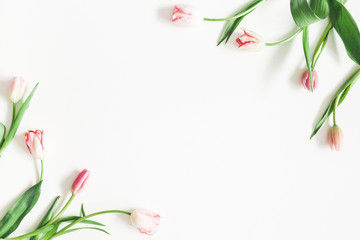 Flowers composition. Pink tulip flowers on white background. Valentines day, mothers day, womens day, spring, easter concept. Flat lay, top view, copy space