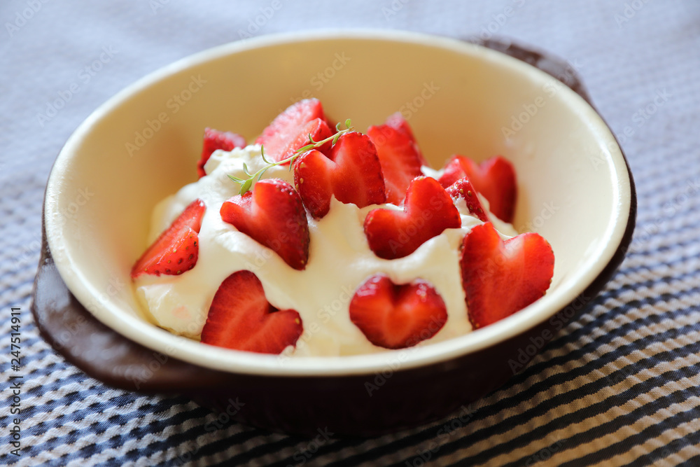 Strawberry with cream on table dessert Strawberry with cream on table dessert