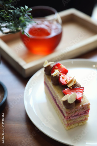 Strawberry cake dessert sweet food with strawberry nuts amd cake on wooden table