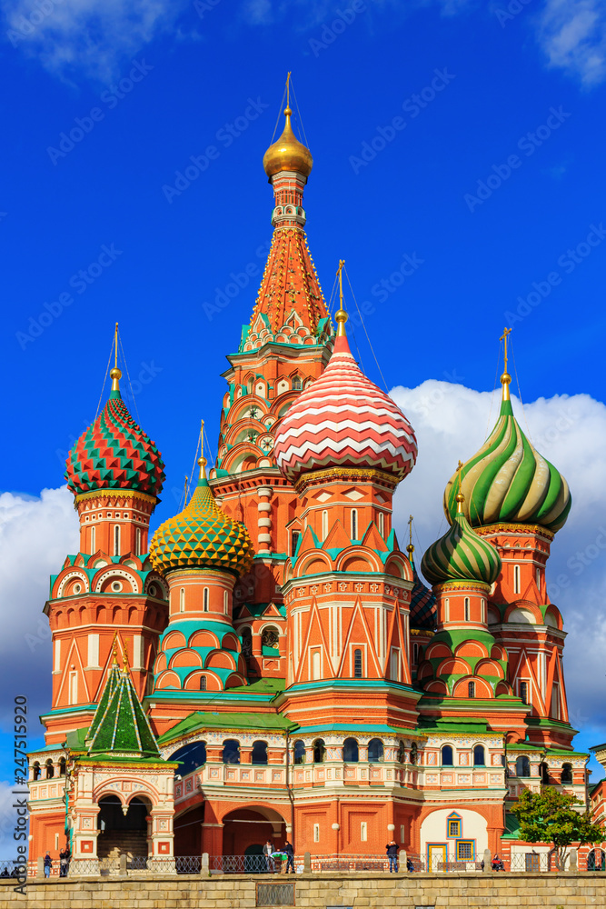 Architecture of St. Basil's Cathedral in Moscow against blue sky with clouds in sunny day Architecture of St. Basil's Cathedral in Moscow against blue sky with clouds in sunny day