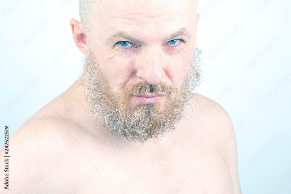 Obraz premium portrait of a bearded man on a light background
