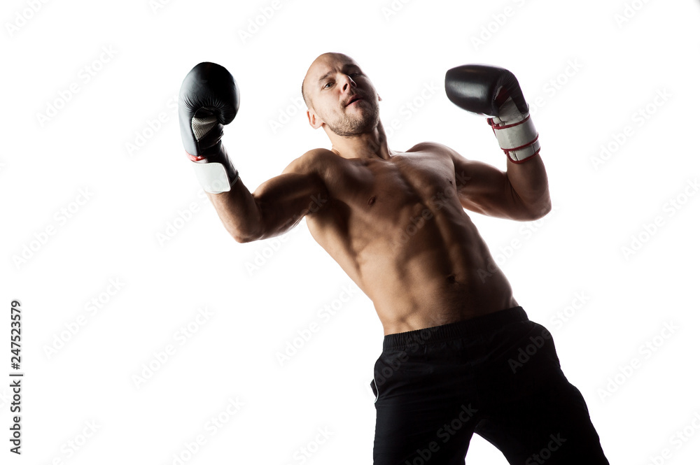 Man doing powerful punch in boxer gloves. Photo of muscular man isolated on white background. Sport. strength, motivation. Man doing powerful punch in boxer gloves. Photo of muscular man isolated on white background. Sport. strength, motivation.