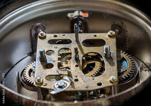close-up antique clock mechanism