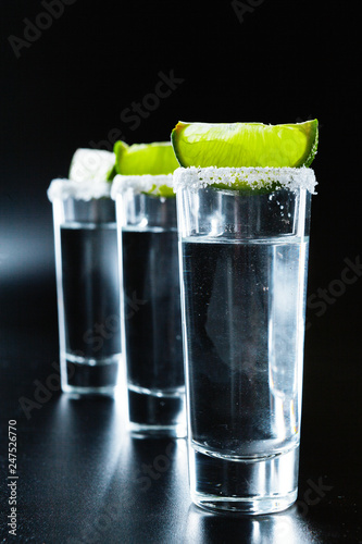 Mexican Tequila in short glasses with lime and salt