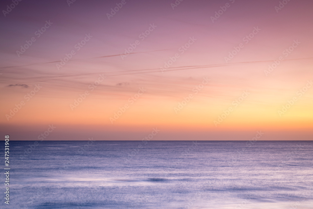 golden and pink skies over the mediterranean sea near valencia