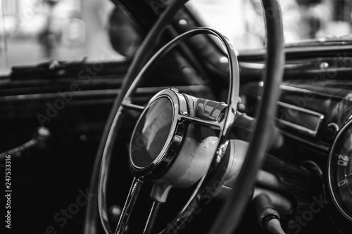 Retro car, retro torpedo car, vintage steering wheel, speedometer, recorder, clock, wooden, © Sergey