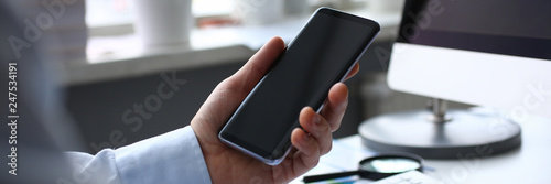 Businessman hipster holds telephone background