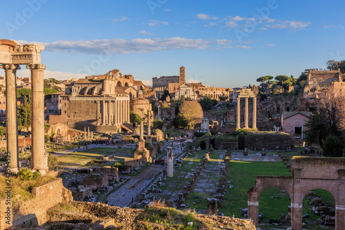 Roman Forums and Colosseum, architecture of ancient Rome, Italy, view in the evening
