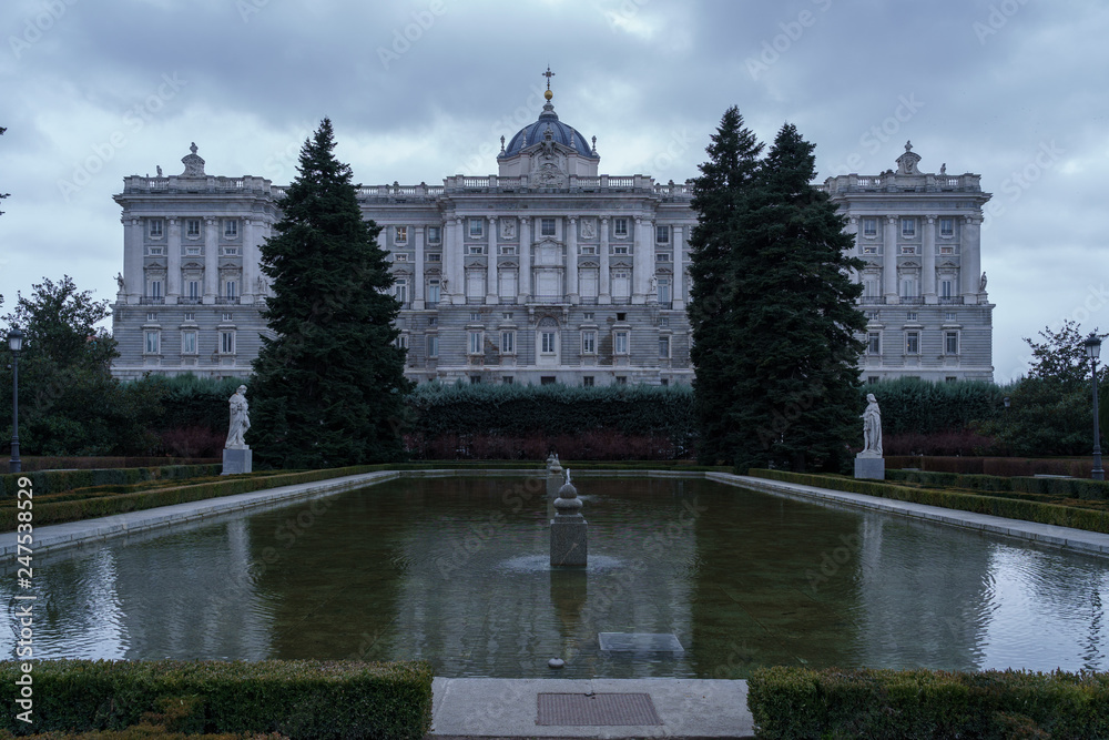 Fototapeta premium Royal Palace in Madrid under the clouds of rainy winter day