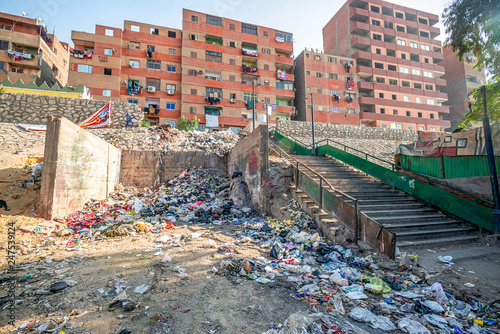 18/11/2018 Cairo, Egypt, pile of garbage lying on the streets of the African capital and accompanied by an unacceptable smear on a sunny day with flies around