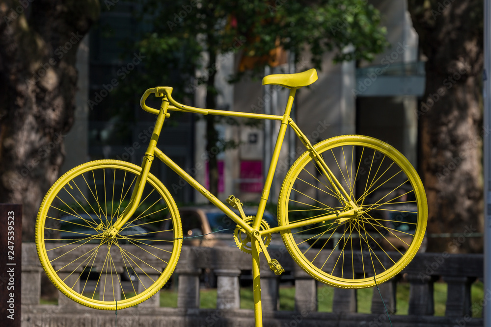 Yellow bicycle on the street