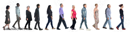 group of mixed people walking on white