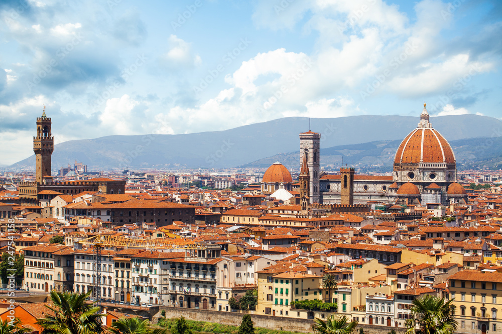 Landscape of Florence in Italy with the ancient tower of Old Palace Palazzo Vecchio, Florence Duomo, Basilica di Santa Maria del Fiore. Firenze landmarks
