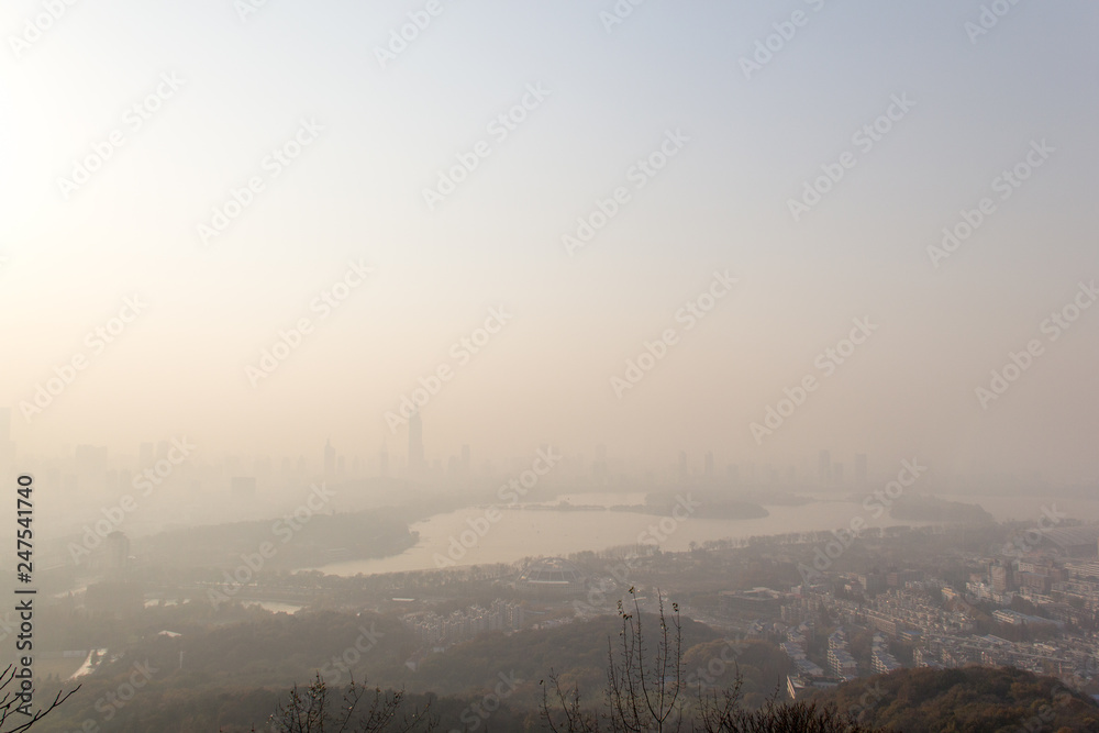City landscape of Nanjing in China in fog