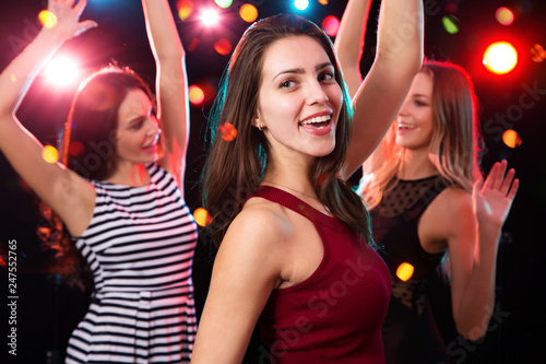 Beautiful girls have fun at a Christmas party