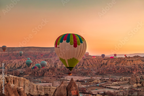 Magnificent dawn with hot air balloons.