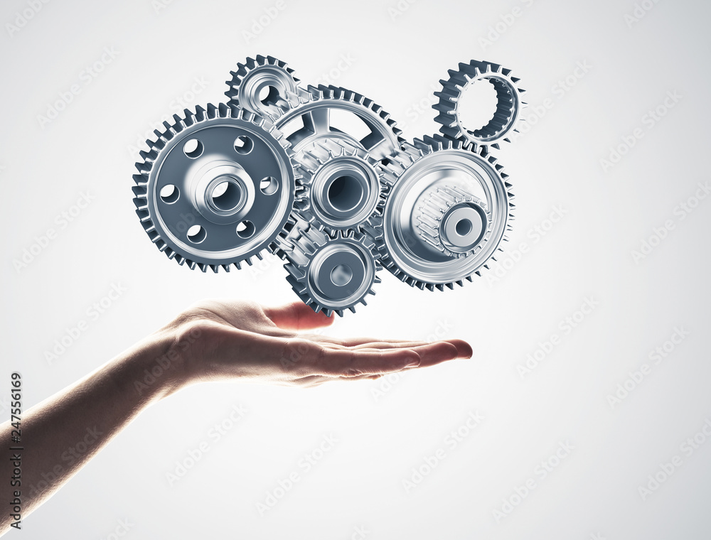 Concept of teamwork and cooperation presented with working gear engine