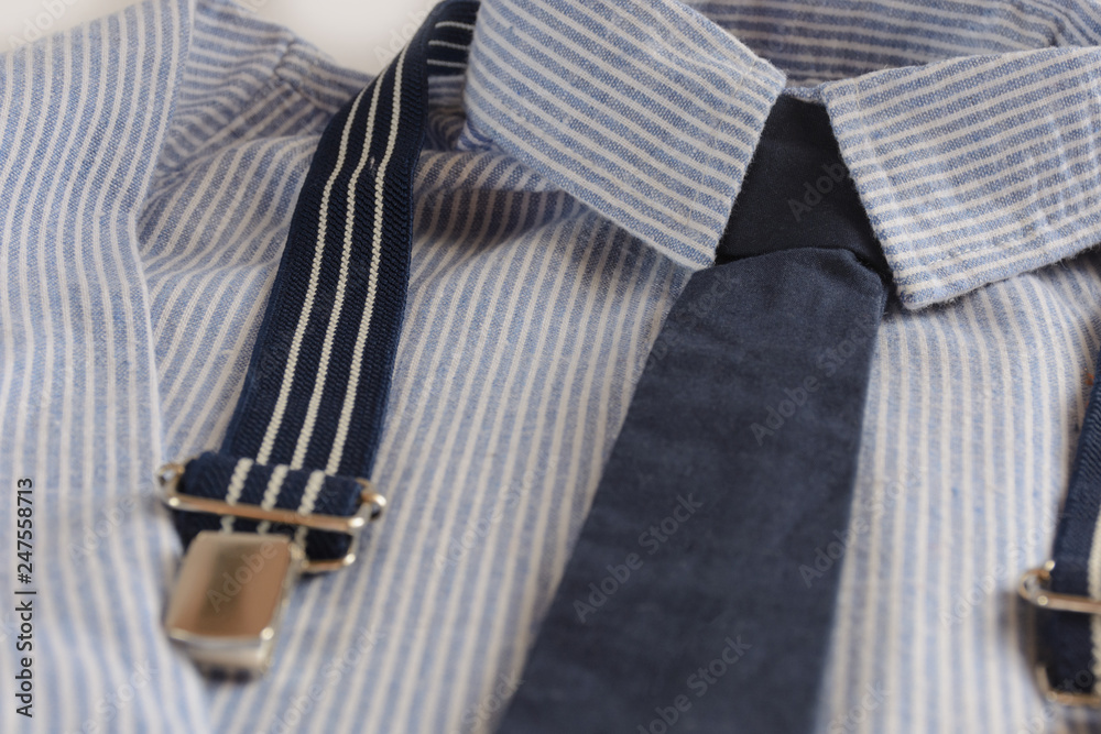 Set of festive clothes for the little boy - white-blue striped, cotton shirt with tie and suspenders