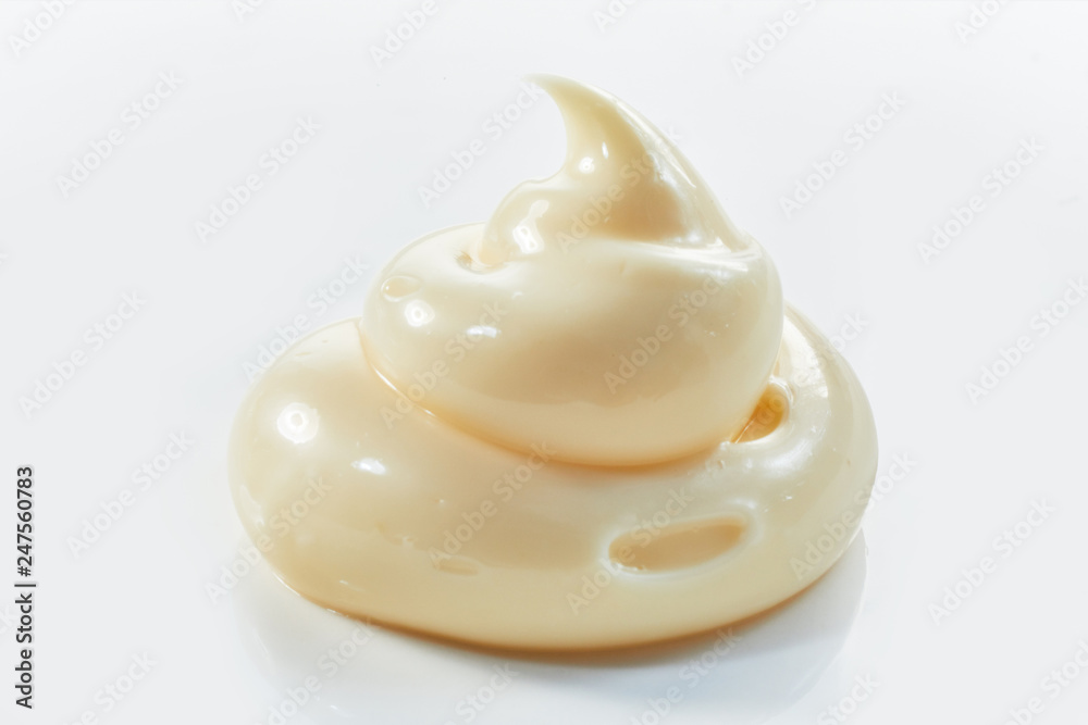 Food styling concept with twirled mayonnaise Food styling concept with twirled mayonnaise