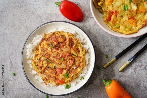 Photography Egg Foo Young served with Jasmine rice