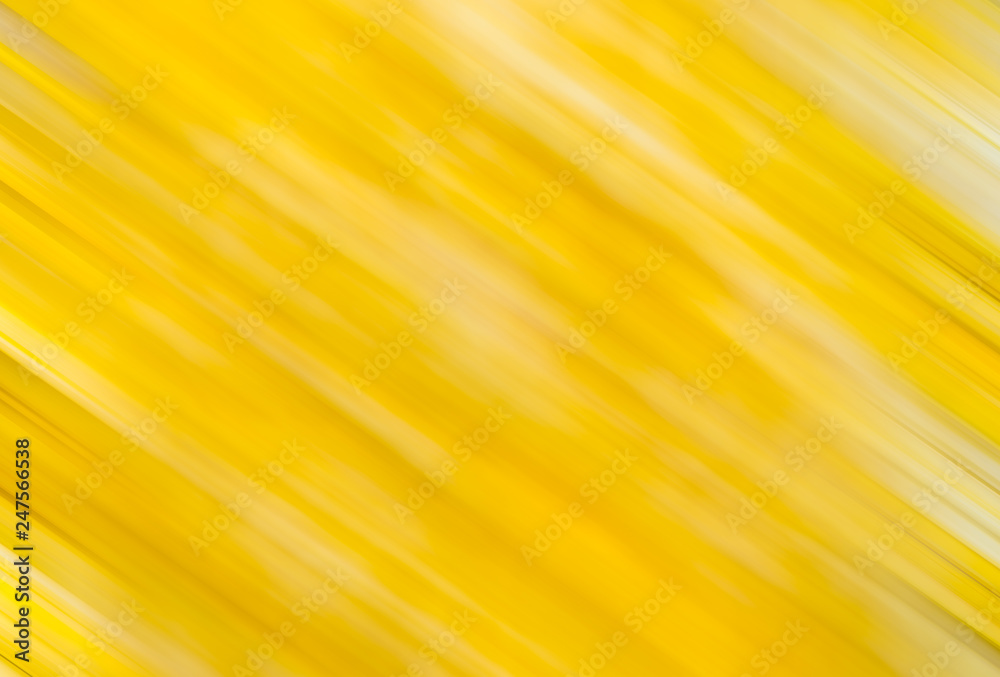 Yellow Blurry abstract background with motion stripes.