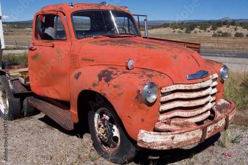 An Abandoned Rusty Red Pickup Truck