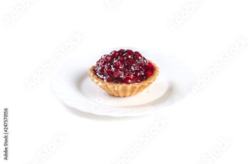 cowberry jelly cake on a white plate isolated on white background