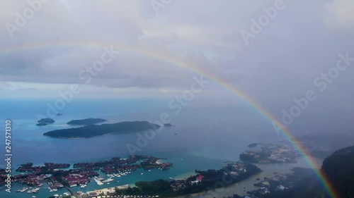 Rainbow after rain on Mount Copolia. Aerial video from the drone. View of the luxurious island of Eden. Seychelles. photo