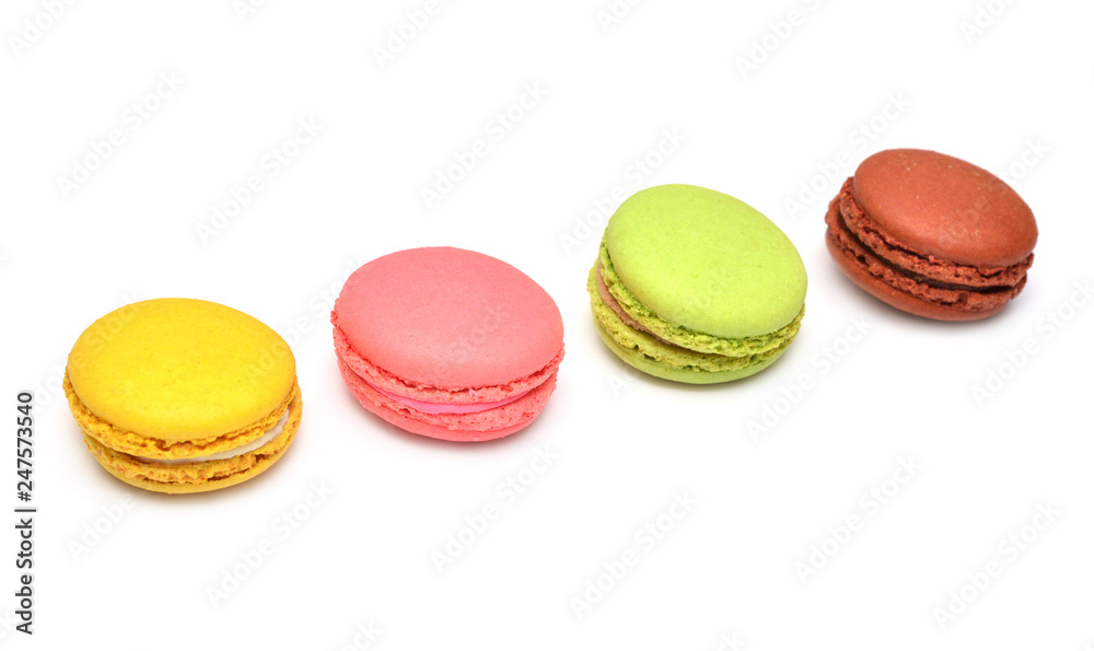 Beautiful macaroons multicolored isolated on white background. French confection Beautiful macaroons multicolored isolated on white background. French confection