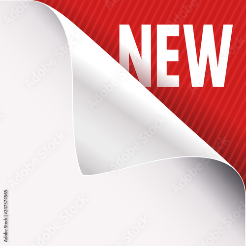Curled white paper corner on red and New sign