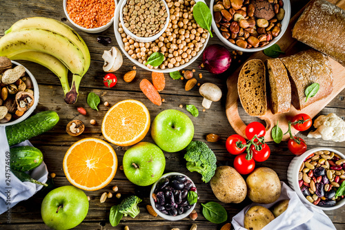 Healthy food. Selection of good carbohydrate sources, high fiber rich food. Low glycemic index diet. Fresh vegetables, fruits, cereals, legumes, nuts, greens. copy space