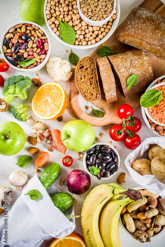 Healthy food. Selection of good carbohydrate sources, high fiber rich food. Low glycemic index diet. Fresh vegetables, fruits, cereals, legumes, nuts, greens.  copy space