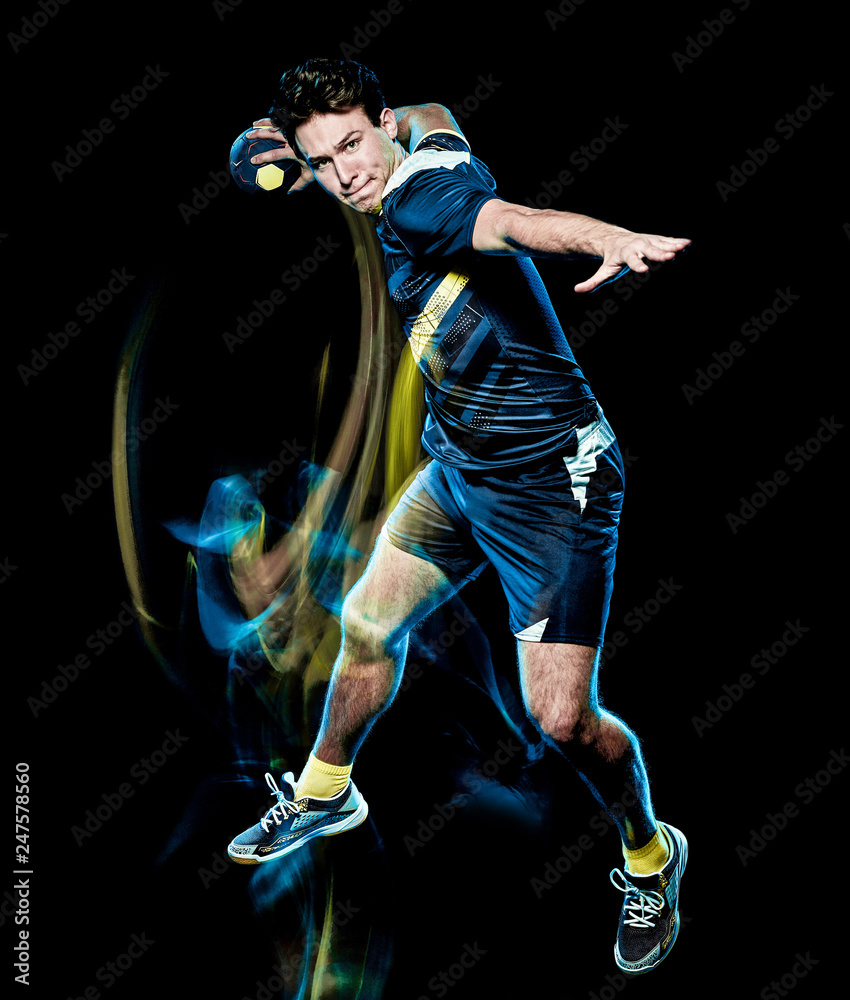 one caucasian handball player young man isolated on black background