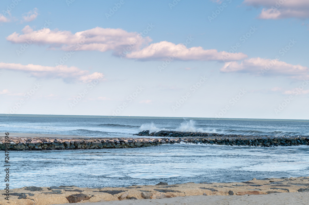 Ocean jetty with crashing waves